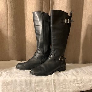 Tall black riding style boots